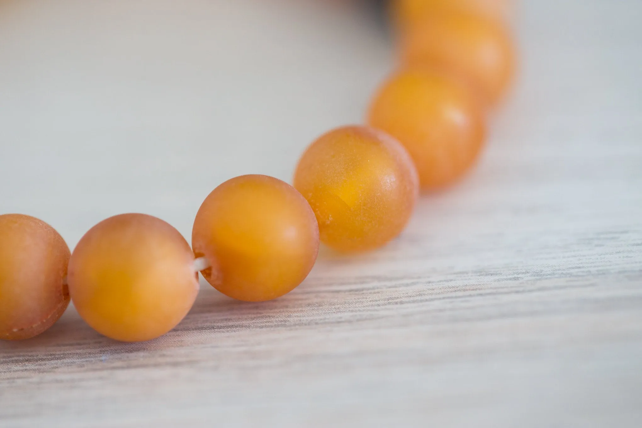 Black Cube Accent Egg Yolk Amber Bracelet