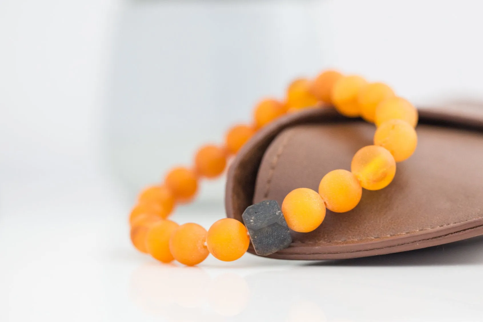 Black Cube Accent Egg Yolk Amber Bracelet