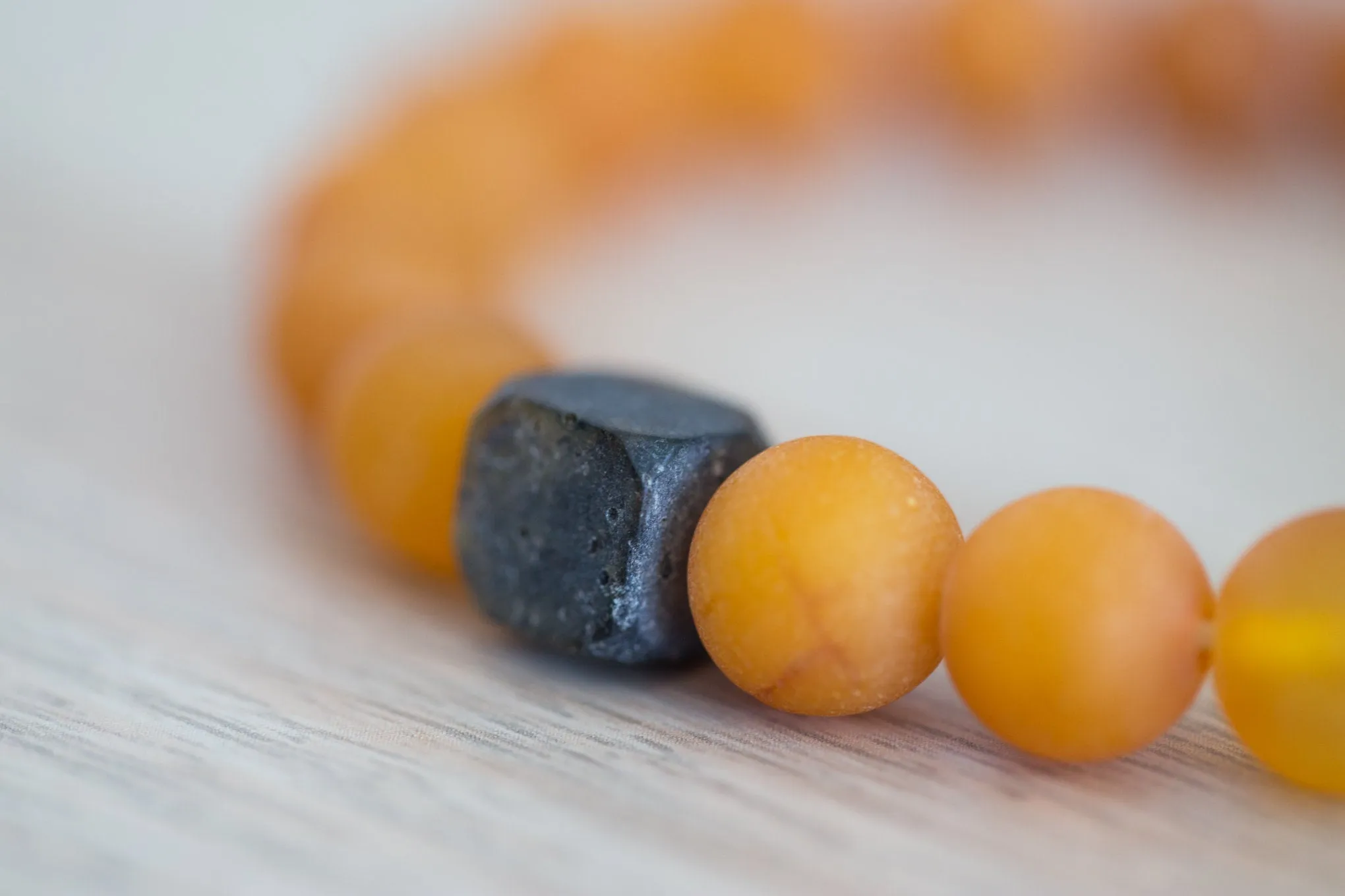 Black Cube Accent Egg Yolk Amber Bracelet