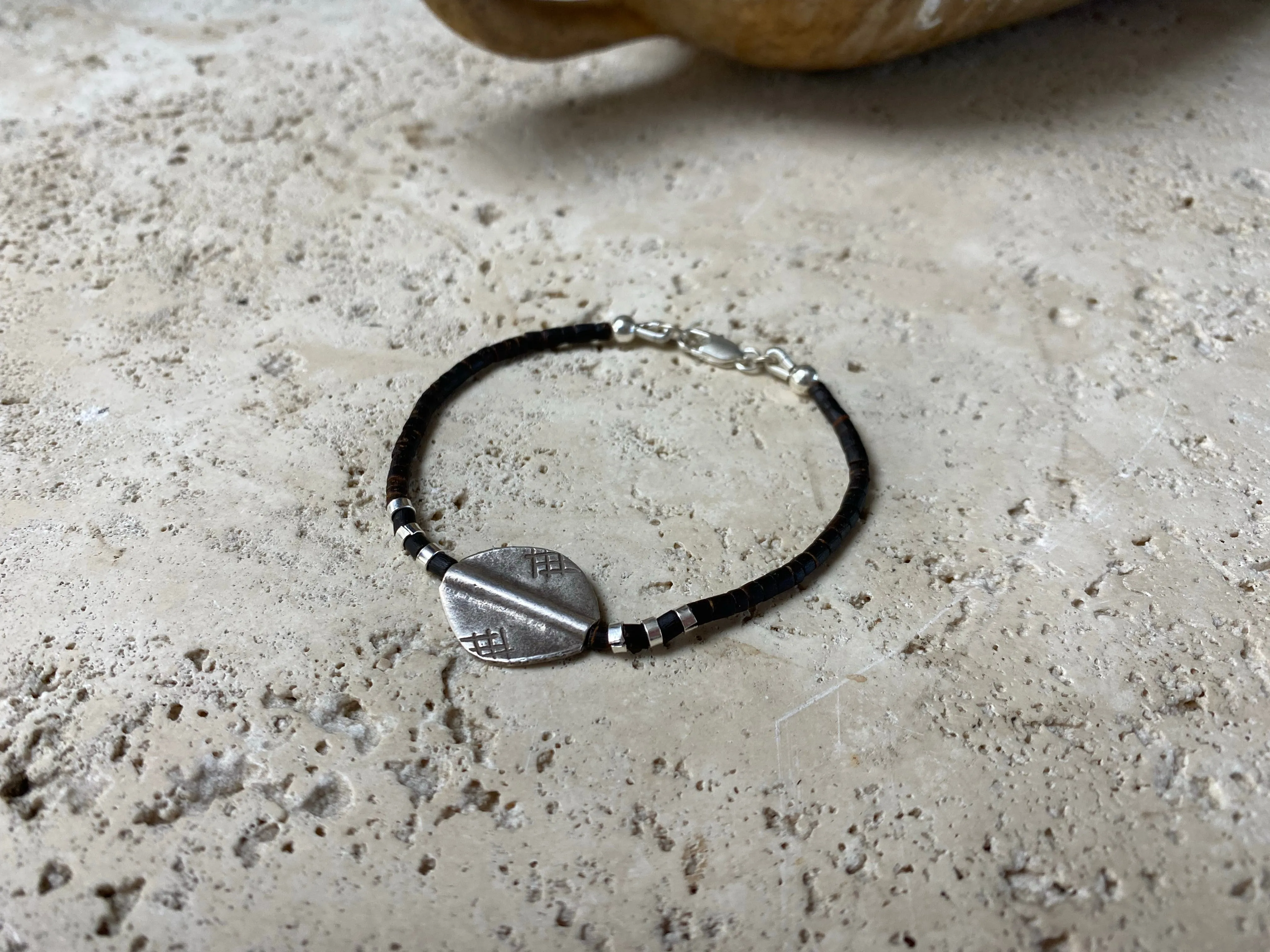 Silver and Coconut Wood Bracelet - Oval Bead With Crosshatching Decoration